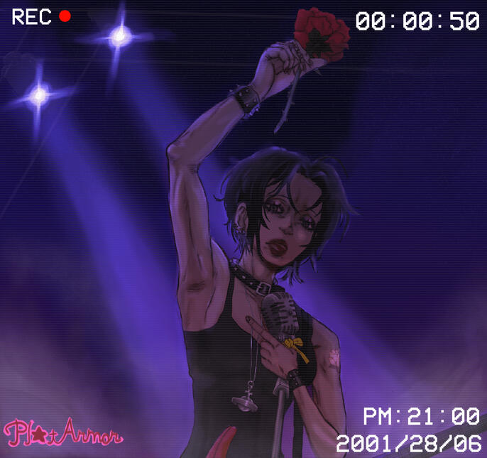 Nana Osaki performing a song played back on an CRT screen